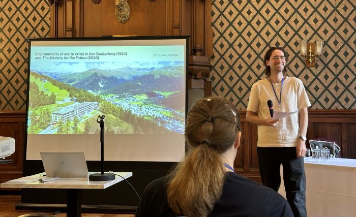 Dr Conor Brennan presenting in Glasgow