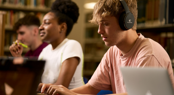 This is an image of a student in a library.