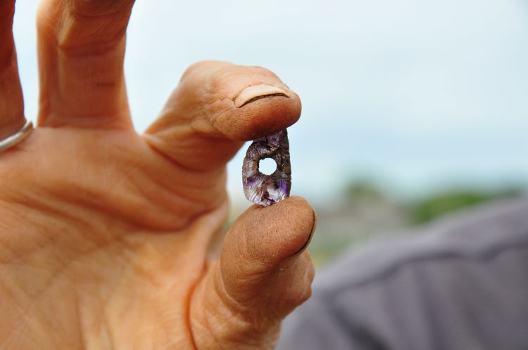 Neolithic amethyst pendant unearthed during the course of the archaeological excavation of a portal tomb at Prospecthill, Oranmore, Co. Galway. 2026
