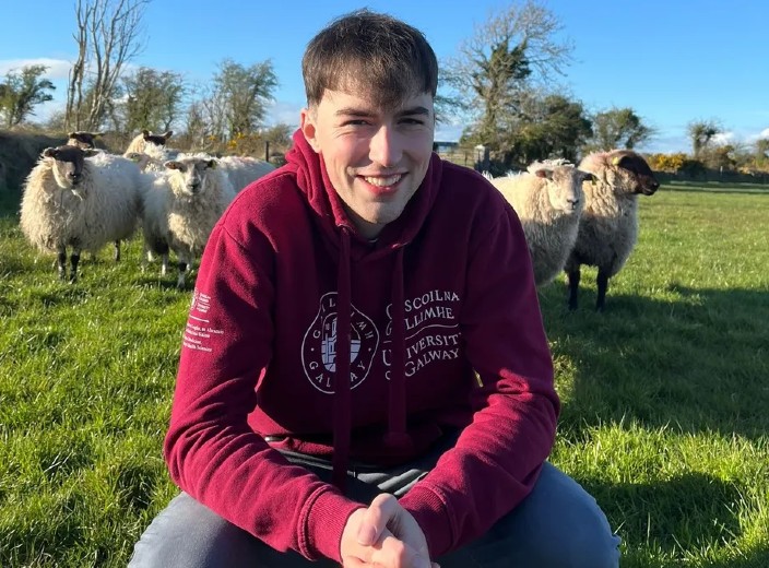 David With Sheep behind him