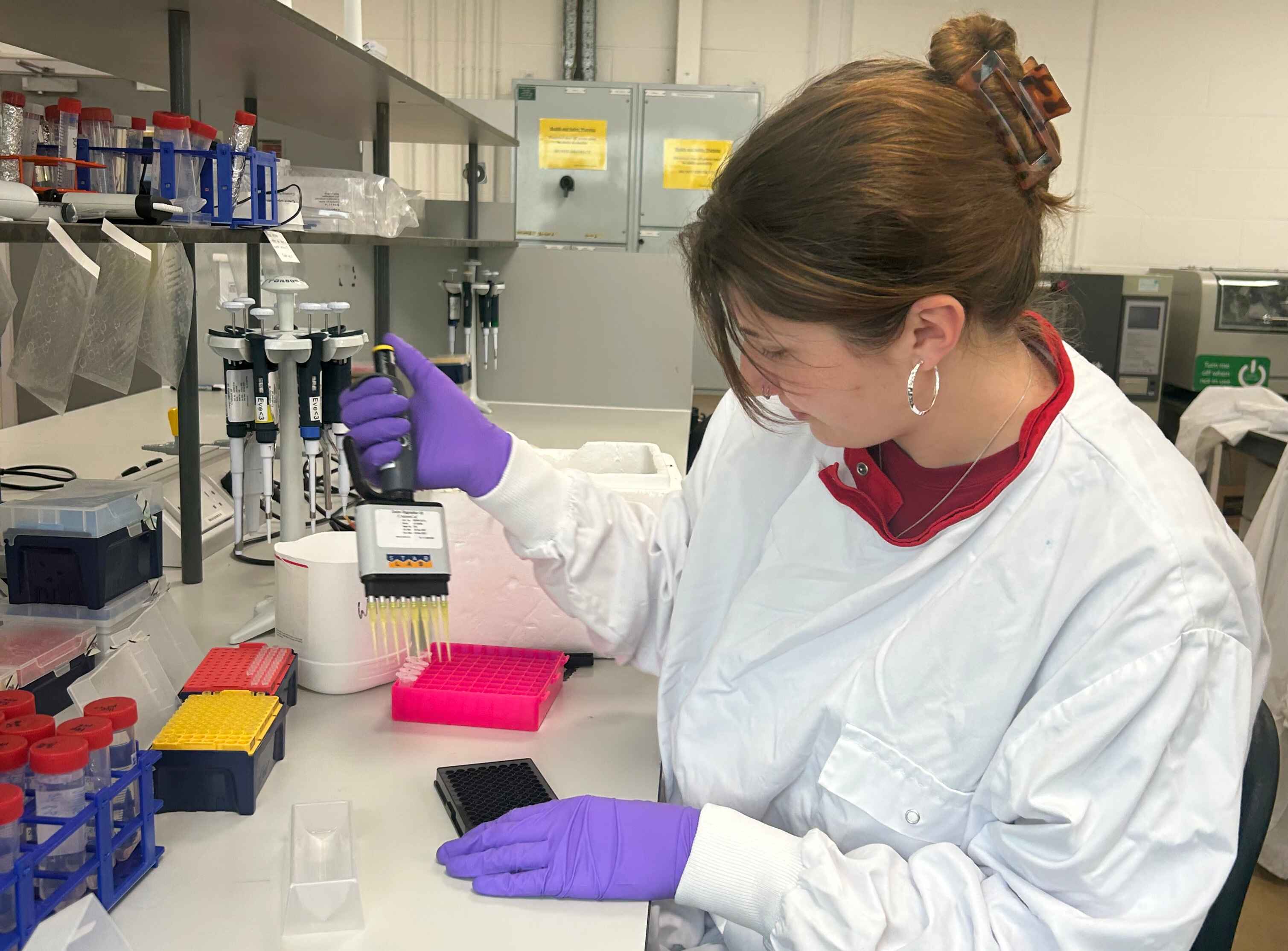 Eve pippetting in the lab