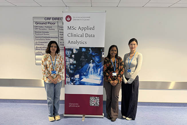 Image of Students in front of an exhibition stand