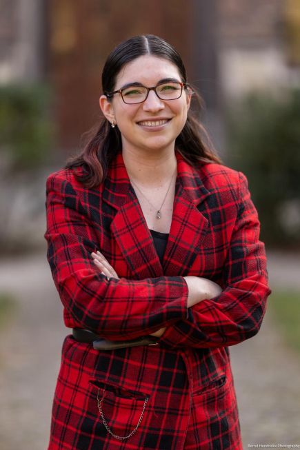Marika Fox outdoors standing with arms folded
