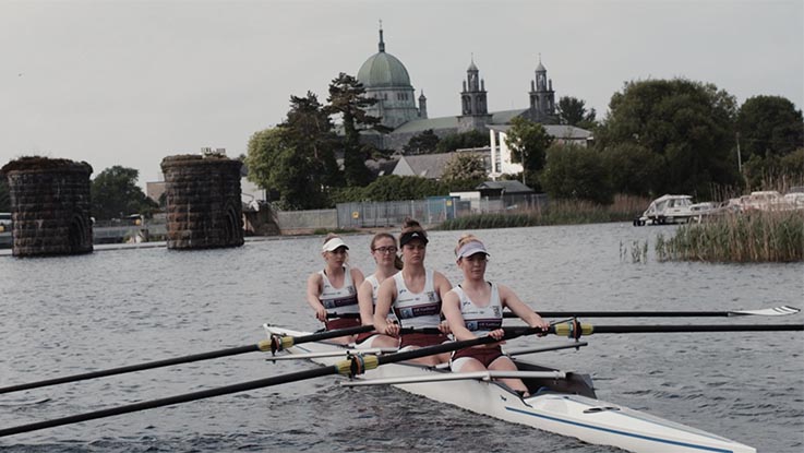Senior squad members of the NUI Galway Galway Rowing Club rowing on the river Corrib in Galway. Phot