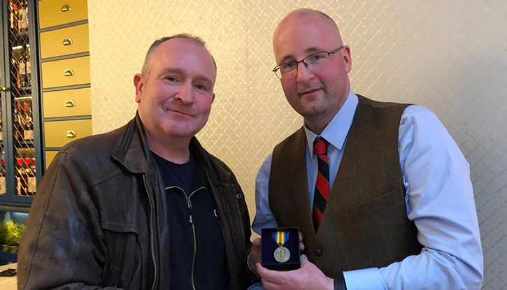 (l-r) Gerard ‘Del’ Delaney presenting James Murray’s WW1 Victory Medal to James’s great grandson Dr